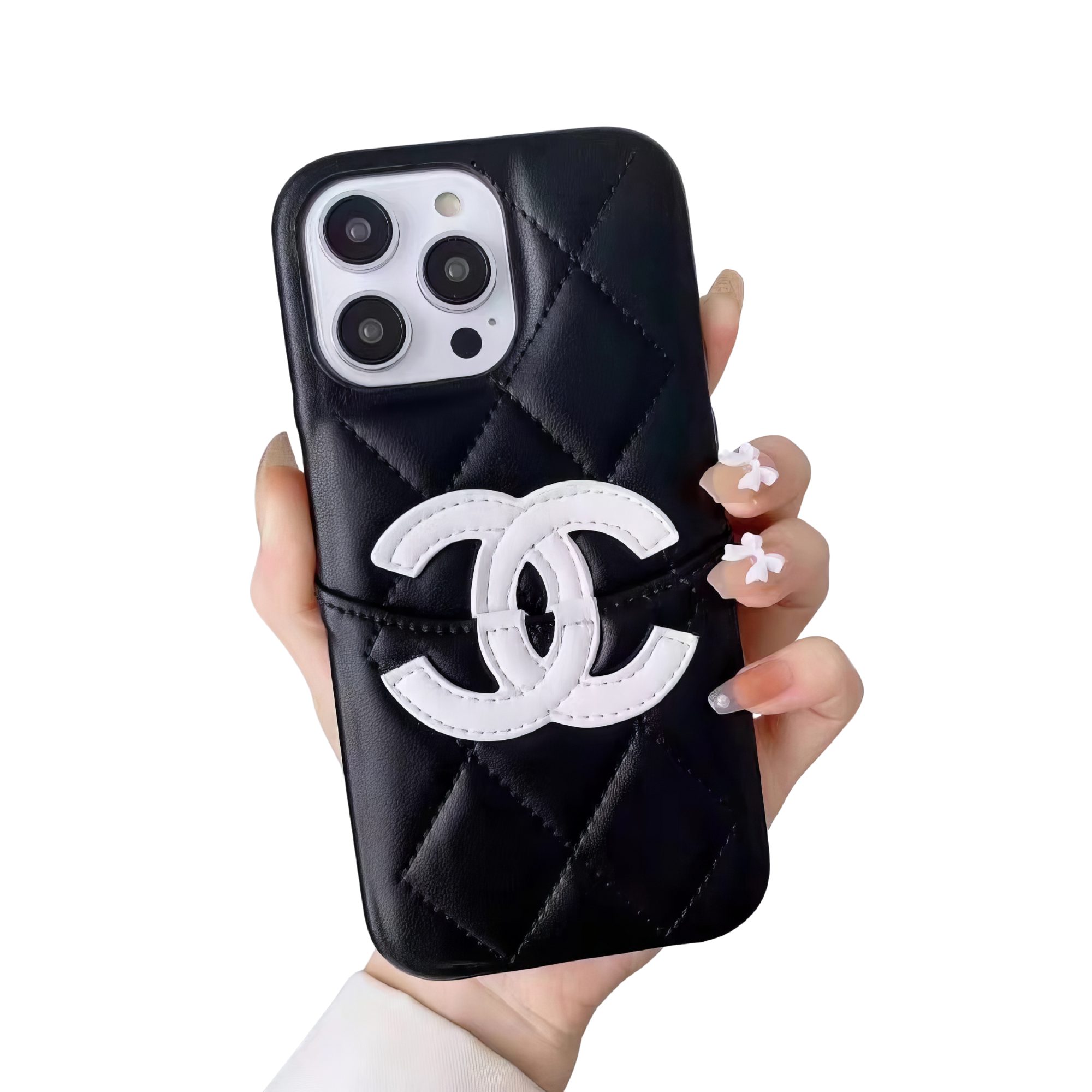 Black quilted leather phone case with white Chanel logo held in hand"
