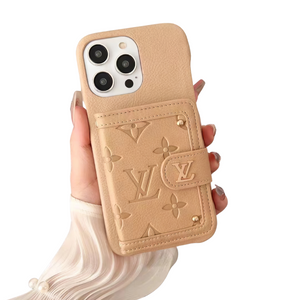 Beige Louis Vuitton leather iPhone case with card holder and monogram pattern.