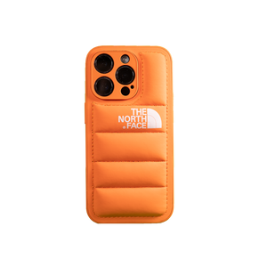 Vivid orange phone case from The North Face, providing standout protection and style.