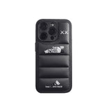 Sleek black The North Face x Kaws smartphone case with creative artistic elements